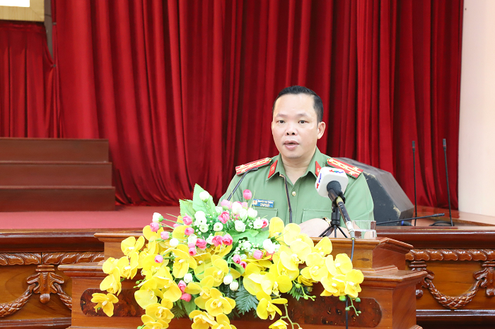 Đồng chí Đại tá Nguyễn Văn Thắng, Phó Giám đốc Công an tỉnh báo cáo tại Hội thảo