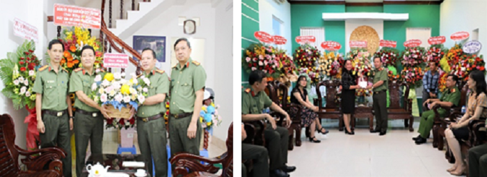Đồng chí Đại tá Nguyễn Văn Thắng tặng hoa chúc mừng Văn phòng thường trú Báo Công an nhân dân tại Đồng bằng sông Cửu Long (hình trái) và Báo Hậu Giang (hình phải)